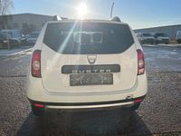 Second-hand Dacia Duster 105 CP (77 kW) 2011 Alb Monovolum
