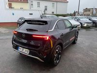 Gebraucht Opel Mokka-e Ultimate 100 kW (136 PS) 2023 Karbon schwarz metallic SUV