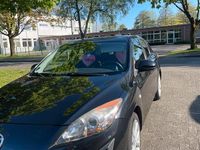 Używany Mazda 3 105 KM (77 kW) 2011 Czarny Sedan/Limuzyna