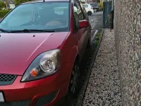 Używany Ford Fiesta 110 KM (80 kW) 2006 Pomarańczowy Hatchback