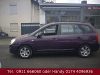 Gebraucht Kia Carens EX 140 PS (102 kW) 2009 Violett Van / Kleinbus