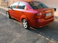 Occasion Chevrolet Aveo 72 ch (52 kW) 2010 Rouge Berline