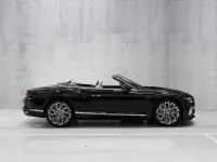 Gebraucht Bentley Continental Mulliner 782 PS (575 kW) 2025 Midnight emerald Cabrio