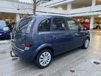 Second-hand Opel Meriva 90 CP (66 kW) 2009 Albastru Monovolum
