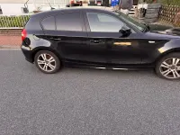 Gebraucht BMW 116 122 PS (89 kW) 2009 Schwarz Kleinwagen