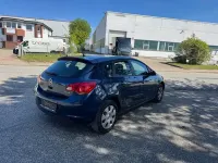 Używany Opel Astra Edition 101 KM (74 kW) 2012 Niebieski Sedan/Limuzyna