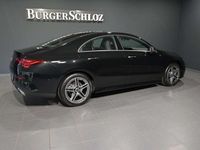 Gebraucht Mercedes CLA200 AMG 163 PS (119 kW) 2024 Metalliclack kosmosschwarz Coupé