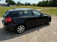Gebraucht BMW 116 122 PS (89 kW) 2010 Schwarz Kleinwagen