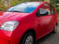 Gebraucht Daihatsu Cuore 54 PS (39 kW) 2004 Rot Kleinwagen