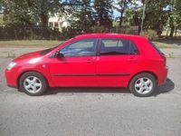 Usado Toyota Corolla 97 HP (71 kW) 2006 Vermelho Sedan
