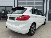 Gebraucht BMW 218 Active Tourer 136 PS (100 kW) 2015 Weiß Van / Kleinbus