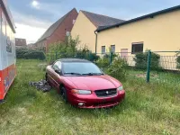 Używany Chrysler Stratus 130 KM (95 kW) 1998 Czerwony Kabriolet