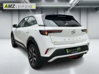 Gebraucht Opel Mokka Elegance 131 PS (96 kW) 2024 Lack weiss banquise/typ aussenverkleidun (metallic) SUV