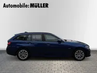 Gebraucht BMW 320e 163 PS (119 kW) 2021 Phytonicblau metallic Kombi