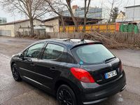 Gebraucht Peugeot 207 74 PS (54 kW) 2009 Schwarz Kleinwagen