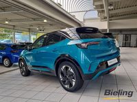 Gebraucht Opel Mokka-e 114 kW (156 PS) 2025 Tropikal grün metallic SUV