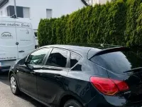 Używany Opel Astra 140 KM (102 kW) 2010 Czarny Sedan/Limuzyna
