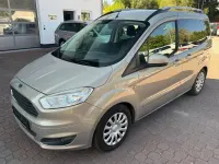 Gebraucht Ford Tourneo Courier Trend 101 PS (74 kW) 2014 Silber Van / Kleinbus