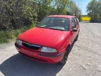 Second-hand Mazda 121 75 CP (55 kW) 1998 Roșu Hatchback