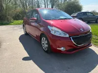 Gebraucht Peugeot 208 Active 92 PS (67 kW) 2013 Rot Kleinwagen