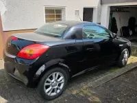 Używany Opel Tigra 90 KM (66 kW) 2006 Czarny Kabriolet