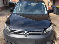 Second-hand VW Caddy 102 CP (75 kW) 2012 Negru Monovolum