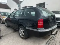 Używany Skoda Octavia 110 KM (80 kW) 2003 Czarny Kombi