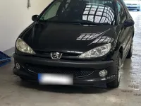 Używany Peugeot 206 75 KM (55 kW) 2007 Czarny Sedan/Limuzyna