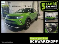 Gebraucht Opel Mokka-e Elegance 100 kW (136 PS) 2023 Matcha green/ikone gruen SUV