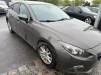 Używany Mazda 3 Center-Line 120 KM (88 kW) 2013 Brązowy Sedan/Limuzyna