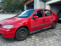 Używany Opel Astra 101 KM (74 kW) 1999 Czerwony Sedan/Limuzyna