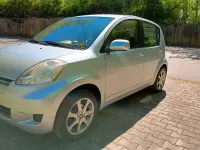 Gebraucht Daihatsu Sirion 69 PS (50 kW) 2011 Grau Kleinwagen