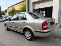 Second-hand Mazda 323 88 CP (64 kW) 1999 Gri Berlinǎ