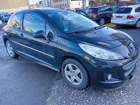 Gebraucht Peugeot 207 73 PS (53 kW) 2011 Schwarz Kleinwagen