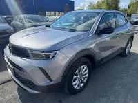 Gebraucht Opel Mokka 131 PS (96 kW) 2023 Kontrast grau/quarz silber SUV