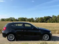Gebraucht BMW 118 143 PS (105 kW) 2010 Schwarz Kleinwagen