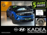 Gebraucht Opel Mokka-e 100 kW (136 PS) 2023 Perl blau/voltaik blau (metallic) SUV