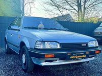 Gebraucht Mazda 323 60 PS (44 kW) 1989 Silber Kleinwagen