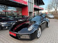 Gebraucht Porsche 911 Carrera 4 Cabriolet 385 PS (283 kW) 2023 Tiefschwarz Cabrio