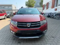 Gebraucht Dacia Sandero Prestige 90 PS (66 kW) 2015 Orange Limousine