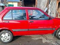 Gebraucht Subaru Justy 75 PS (55 kW) 1994 Rot Kleinwagen
