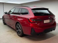 Gebraucht BMW 330e Comfort Edition 292 PS (214 kW) 2025 Fire red metallic Kombi