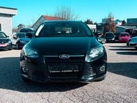 Gebraucht Ford Focus Titanium 116 PS (85 kW) 2012 Pantherschwarz metallic Kombi