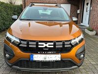 Gebraucht Dacia Sandero Expression 91 PS (66 kW) 2023 Orange Limousine