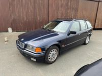 Gebraucht BMW 320 Basis 150 PS (110 kW) 1998 Blau Kombi