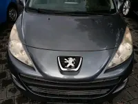 Gebraucht Peugeot 207 74 PS (54 kW) 2011 Grau Kleinwagen