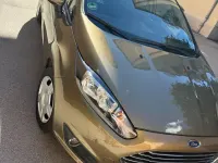 Gebraucht Ford Fiesta Trend 95 PS (69 kW) 2013 Gold Limousine