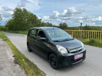 Gebraucht Daihatsu Cuore 70 PS (51 kW) 2007 Schwarz Kleinwagen
