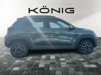 Gebraucht Dacia Spring Extreme 47 kW (65 PS) 2023 Grün "flechtengrau" Kleinwagen