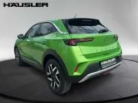 Gebraucht Opel Mokka Elegance 131 PS (96 kW) 2022 Matcha grün (metallic) SUV